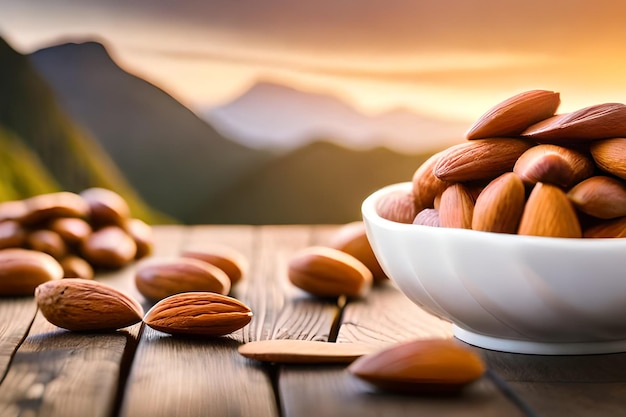 Un bol de almendras sobre una mesa con una montaña al fondo