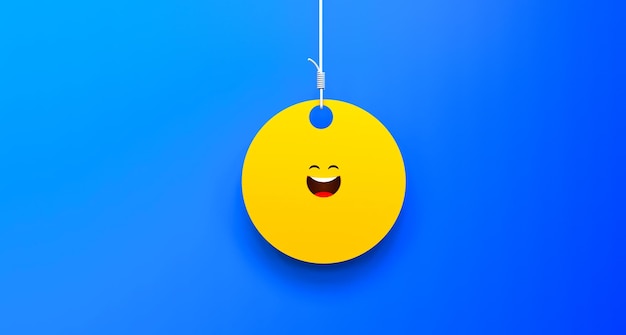 Una bola amarilla con una cara en una cuerda.
