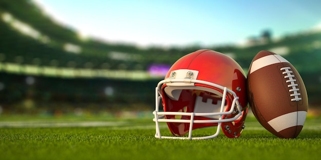 Bola de futebol americano e capacete na grama da arena ou estádio de futebol