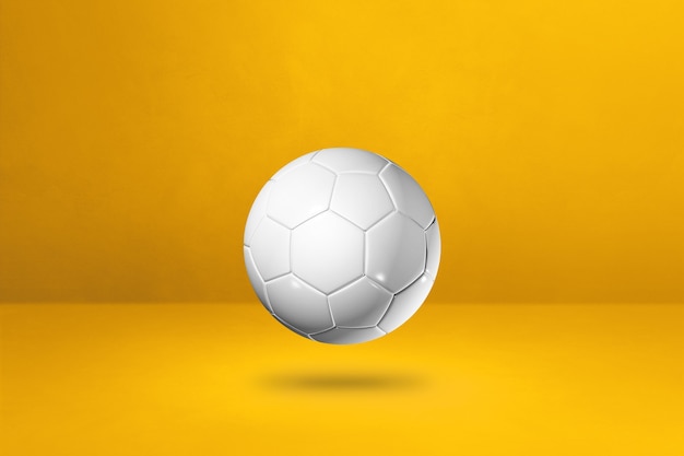 Foto bola de futebol branca isolada em amarelo. ilustração 3d