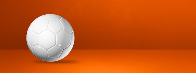Bola de futebol branca isolada em um banner laranja do estúdio. Ilustração 3D