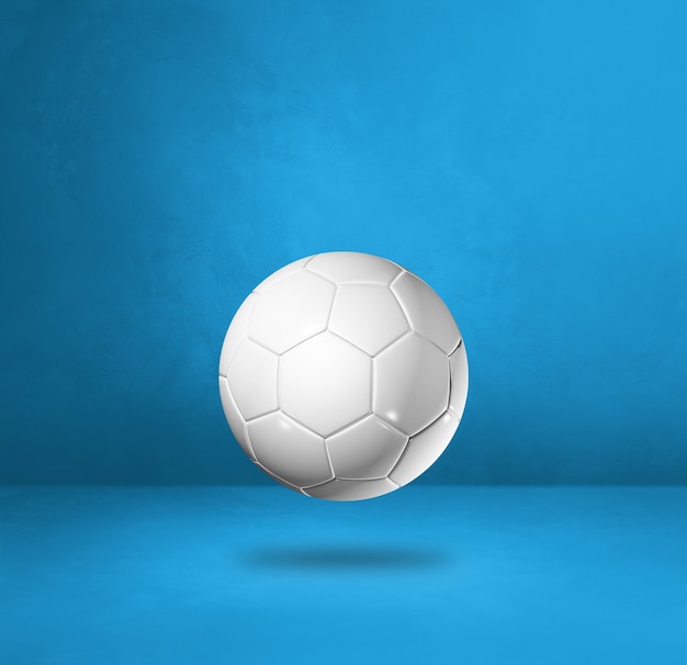 Foto bola de futebol branca isolada em um fundo azul do estúdio. ilustração 3d