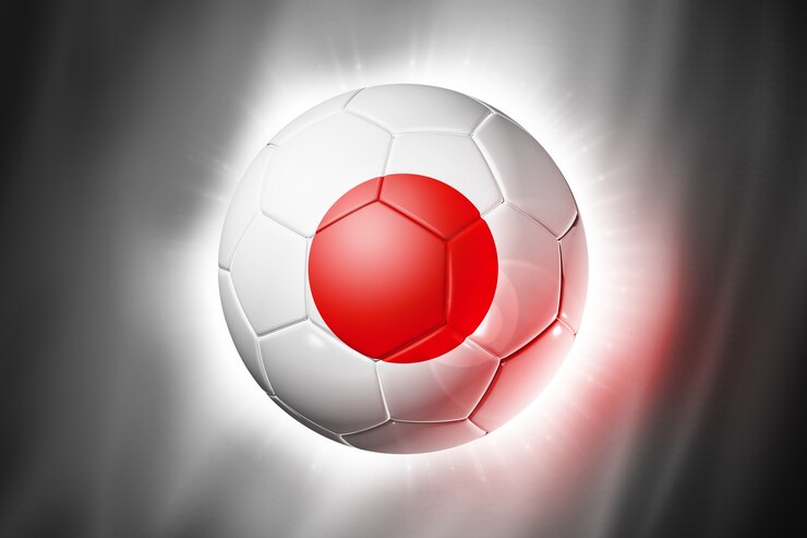 Foto bola de futebol com bandeira do japão