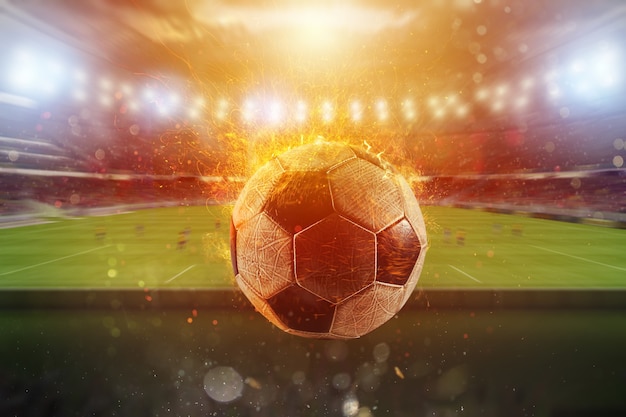 Bola de futebol em chamas sai de um estádio de futebal