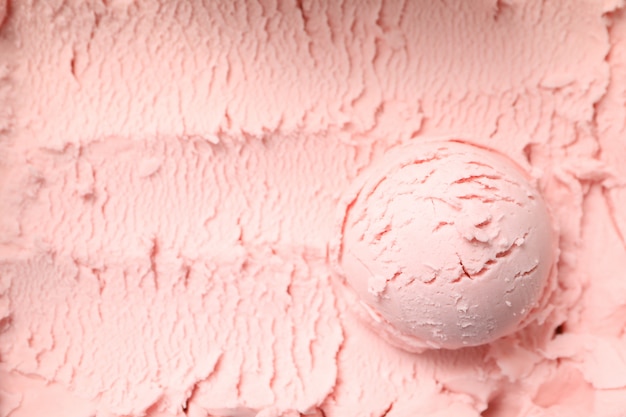 Bola de helado en superficie rosa