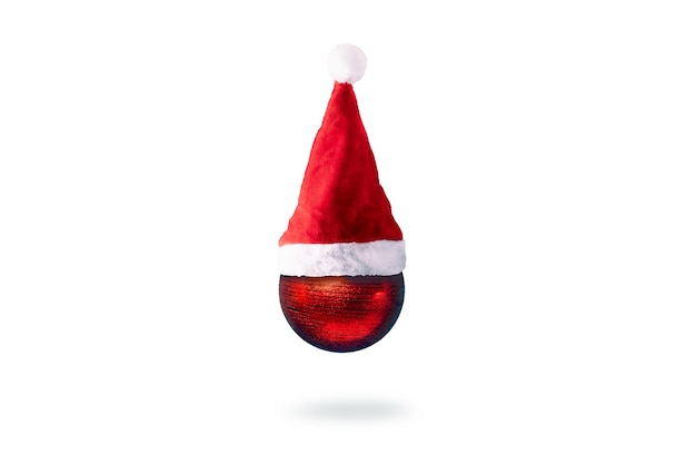 Bola roja de Navidad en gorro de Papá Noel