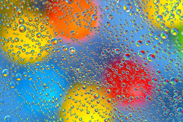 Bolas de colores abstractos de líquido aceitoso sobre un fondo borroso textura de fondo abstracto