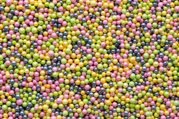 Bolas de açúcar doces multicoloridas. Padrão de bola pequena.