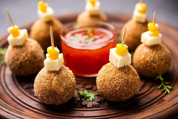 Bolas de queijo de milho com lanche de festa popular da Índia