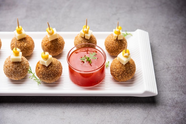 Bolas de queijo de milho com lanche de festa popular da Índia