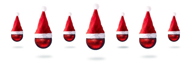 Bolas vermelhas de natal em chapéus de papai noel