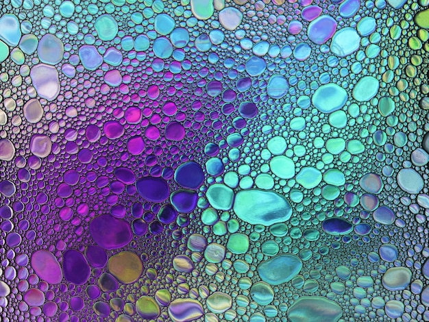 Bolhas de sabão multicoloridas abstratas do óleo da água misturam a textura