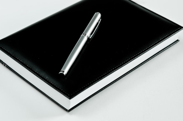 Foto bolígrafo y cuaderno