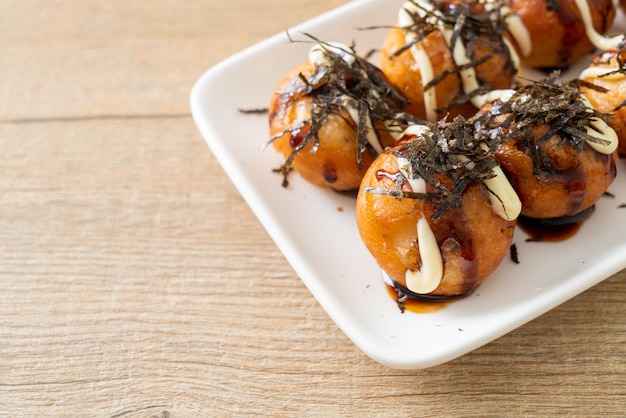 Bolinhos de bolinhos Takoyaki ou bolas de polvo