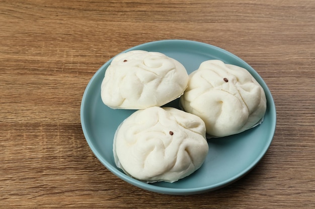 Foto bollo al vapor tradicional chino bakpao enfoque de imagen seleccionada de cerca