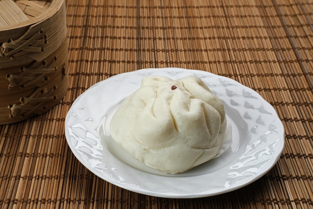 Foto bollo al vapor tradicional chino bakpao enfoque de imagen seleccionada de cerca