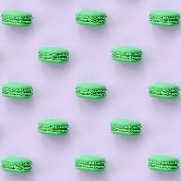 Bolo de sobremesa verde macaron ou padrão de macaroon na moda lilás pastel