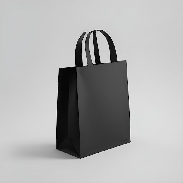 Una bolsa negra con una maqueta de bolsa de papel con asa