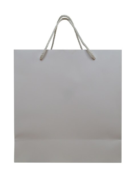 Foto bolsa de papel blanco aislado