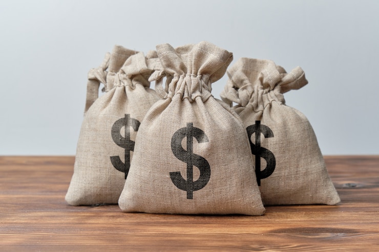 Foto bolsas abstractas con dinero y signo de dólar estadounidense