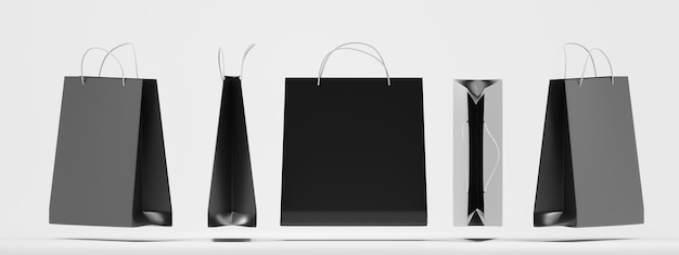 Bolsas de compras de papel negro en la parte delantera superior y vista en ángulo maqueta Paquetes de regalo cuadrados en blanco con asas sobre fondo blanco aislado Embalaje rectangular para diseño de identidad corporativa conjunto 3d