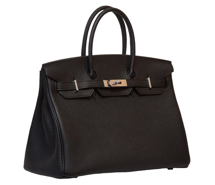 Bolso de cuero negro para mujer aislado en blanco