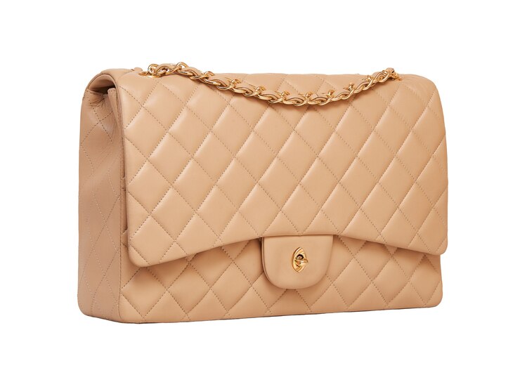 Bolso de mujer de cuero beige aislado en blanco