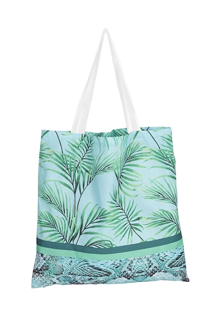 Un bolso tote con estampado de hojas de palmera