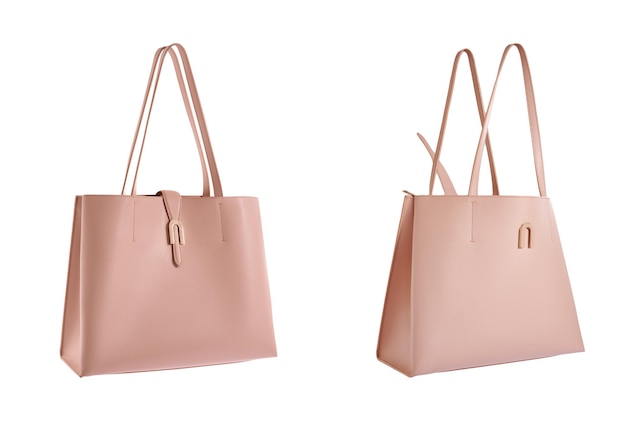 Bolsos de cuero rosado para mujeres aislados sobre fondo blanco