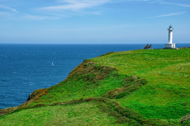 Bonito faro de la costa cantábrica en Lastres Asturias