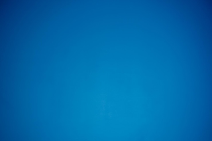 Foto bonito fondo de espacio borroso y abstracto azul
