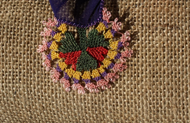 Bordado floral colorido de la aguja como fondo