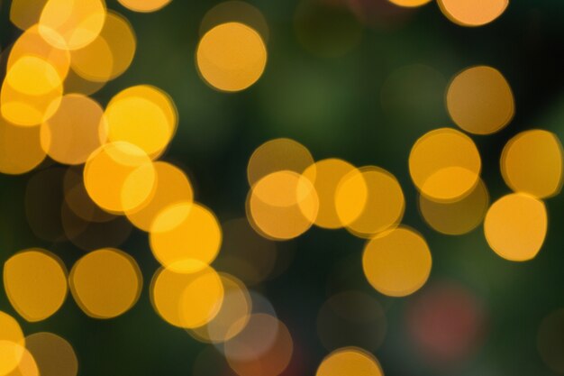 Borrosa círculos de luz de Navidad amarillo