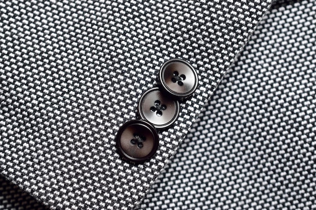 Foto botão preto no terno de tweed