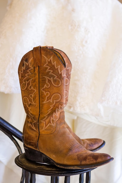 Foto botas de vaquero para usar en la boda occidental.