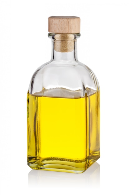 Foto botella de aceite amarillo con tapa