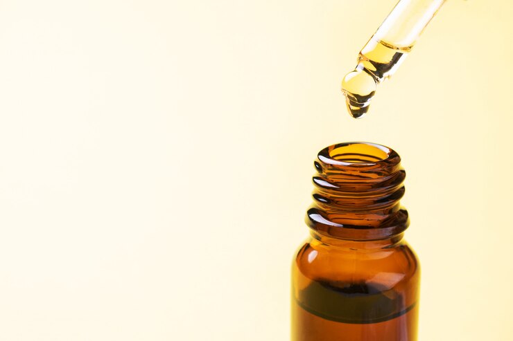 Botella de aceite cosmético con pipeta