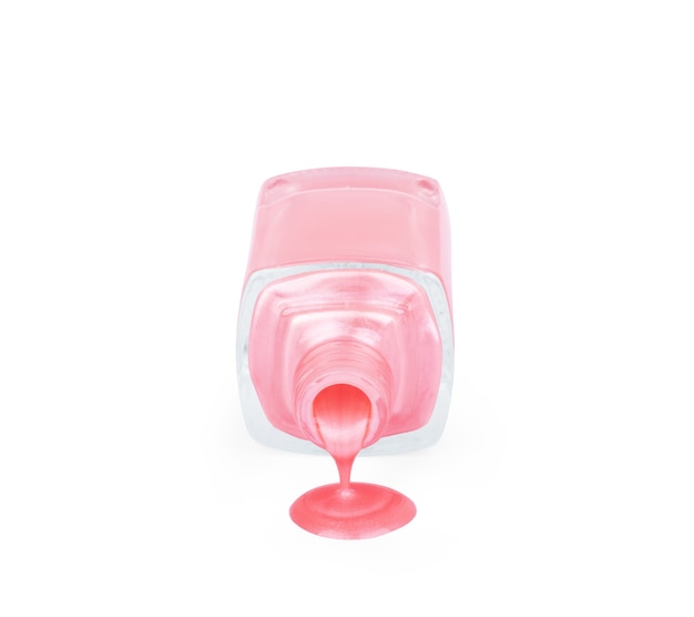 Botella de esmalte de uñas rosa con muestras de gota de esmalte aislado