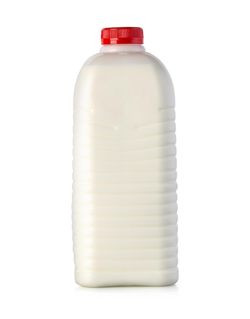 Botella de leche con tapón rojo aislado