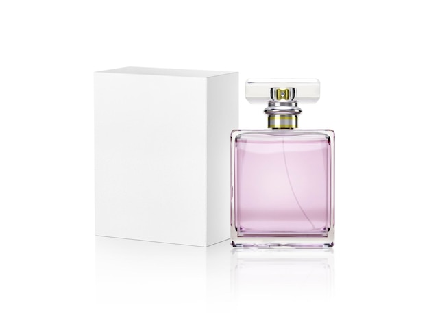 Foto botella de perfume y caja de embalaje blanca.