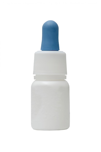Botella de plástico blanco con una pipeta para gotas nasales