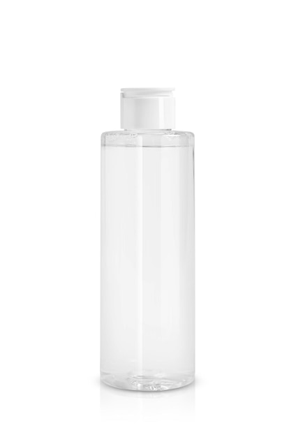 Botella transparente con producto cosmético sobre fondo blanco.