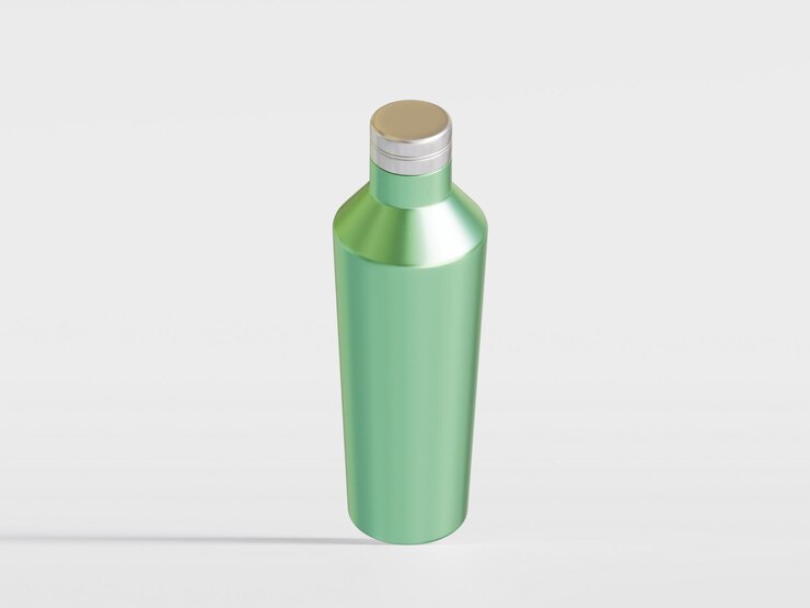 Foto una botella verde con una tapa de plata y una tapa de prata