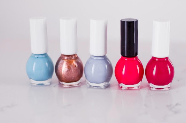 Foto botellas de esmalte de uñas colección de manicura y pedicura