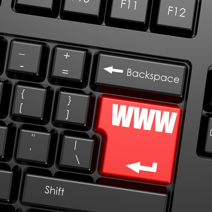 Foto botón enter rojo en la palabra www del teclado de la computadora