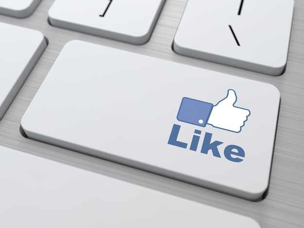 Botón Me gusta en el teclado moderno. Concepto de redes sociales.