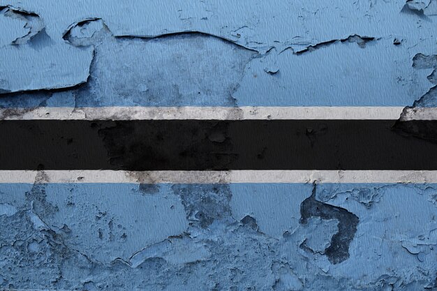 Botswana-Flagge, die auf Schmutz gemalt wurde, knackte Wand