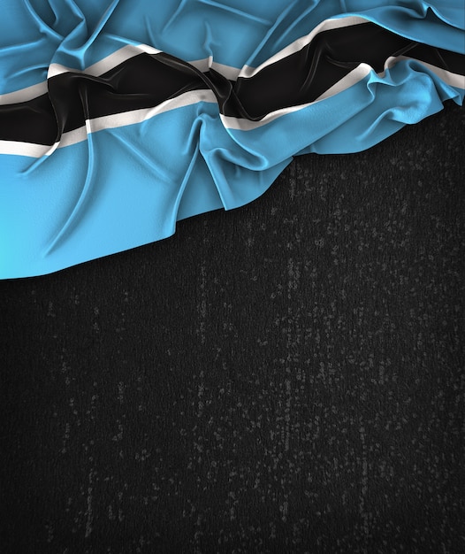 Botswana-Flagge Vintag auf einem Grunge-Schwarz-Tafel mit Raum für Text