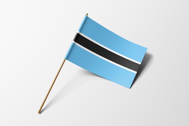 Foto botswana pequeña bandera de papel sobre fondo blanco.