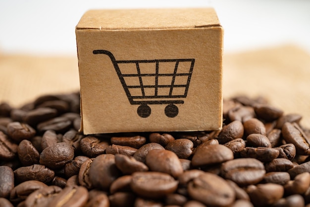 Box mit Einkaufswagen-Logo-Symbol auf Kaffeebohnen, Import-Export-Shopping online oder E-Commerce-Lieferservice-Shop Produktversand, Handel, Lieferantenkonzept.